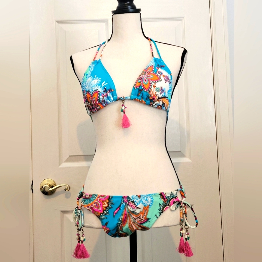 Bikini size Medium. Tags removed. Good used condition.